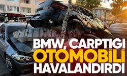 BMW, çarptığı otomobili havalandırdı