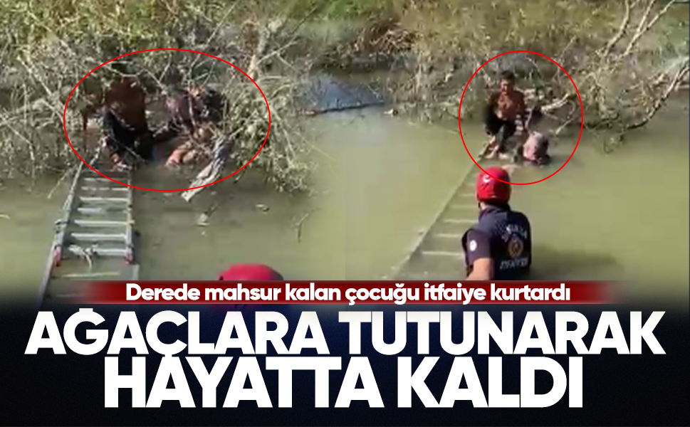 Ağaçlara tutunarak hayatta kaldı...Derede mahsur kalan çocuğu itfaiye kurtardı